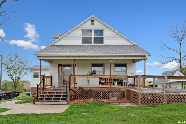 829 Union Ave, Lowden, IA 52255 - rear view of property with a shingled roof and a yard