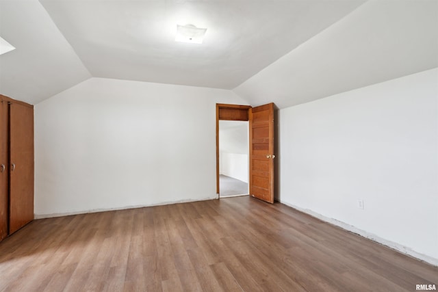 829 Union Ave, Lowden, IA 52255 - bonus room with vaulted ceiling and light wood-style flooring