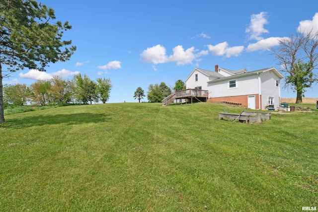 829 Union Ave, Lowden, IA 52255 - view of green lawn with a wooden deck and stairway