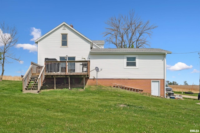 829 Union Ave, Lowden, IA 52255 - rear view of property with a wooden deck, stairway, a yard, and a shingled roof