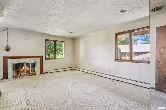 2351 5th St, East Moline, IL 61244 - unfurnished living room with carpet, a fireplace, crown molding, baseboard heating, and a textured ceiling