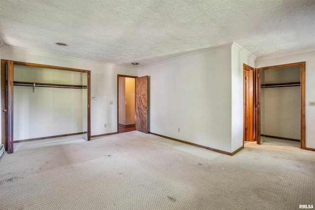 2351 5th St, East Moline, IL 61244 - unfurnished bedroom with a closet, light carpet, ornamental molding, and a textured ceiling