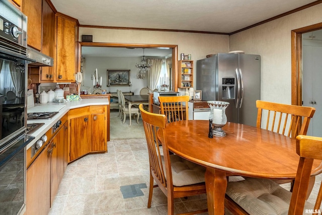 613 S Locust, West Frankfort, IL 62896 - dining space with crown molding and a chandelier