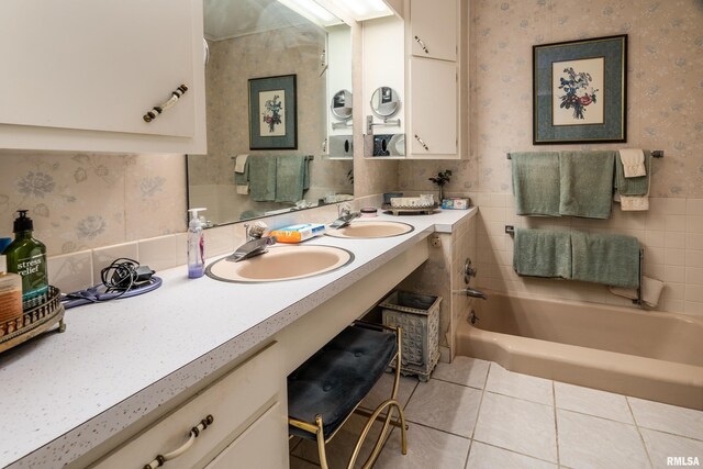613 S Locust, West Frankfort, IL 62896 - bathroom with wallpapered walls, tile patterned flooring, a tub, and double vanity