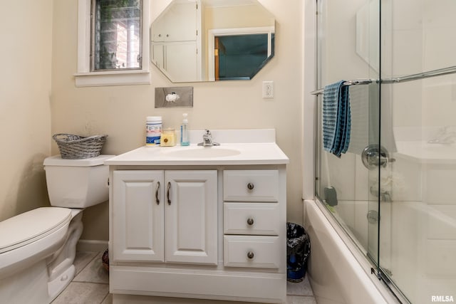 613 S Locust, West Frankfort, IL 62896 - bathroom featuring vanity, combined bath / shower with glass door, and tile patterned floors