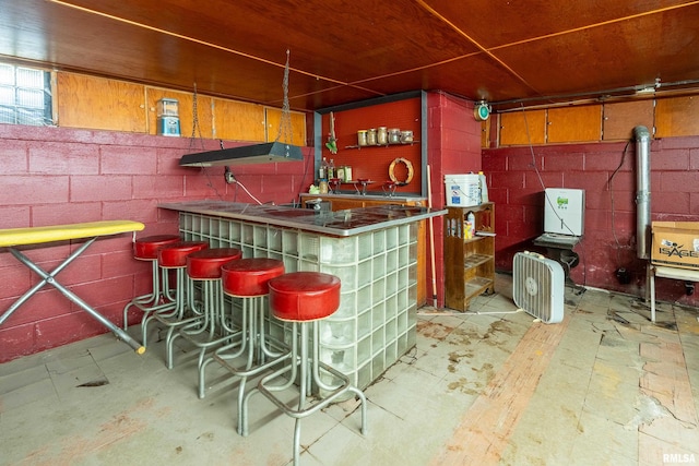 613 S Locust, West Frankfort, IL 62896 - indoor dry bar featuring concrete block wall