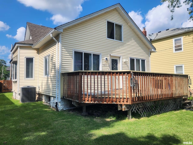 3217 18th Ave, Rock Island, IL 61201 - back of property with a lawn, a wooden deck, and roof with shingles