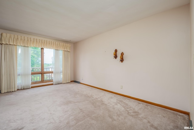 2518 13th St, Rock Island, IL 61201 - carpeted spare room with baseboards