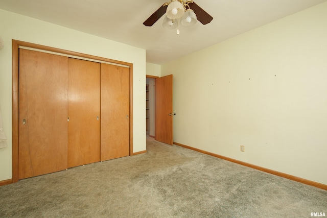 2518 13th St, Rock Island, IL 61201 - unfurnished bedroom featuring carpet, a closet, and a ceiling fan