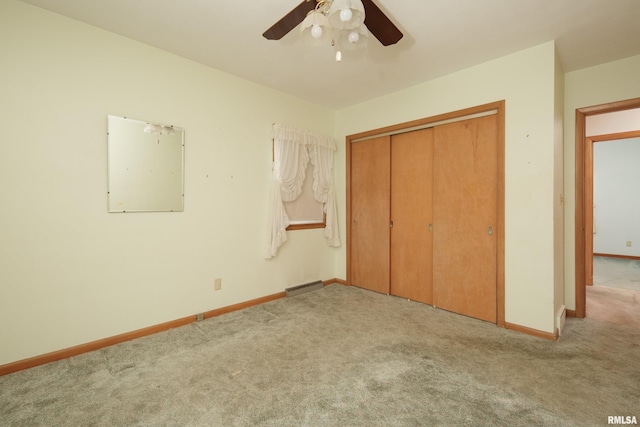 2518 13th St, Rock Island, IL 61201 - unfurnished bedroom with carpet floors, a closet, and ceiling fan