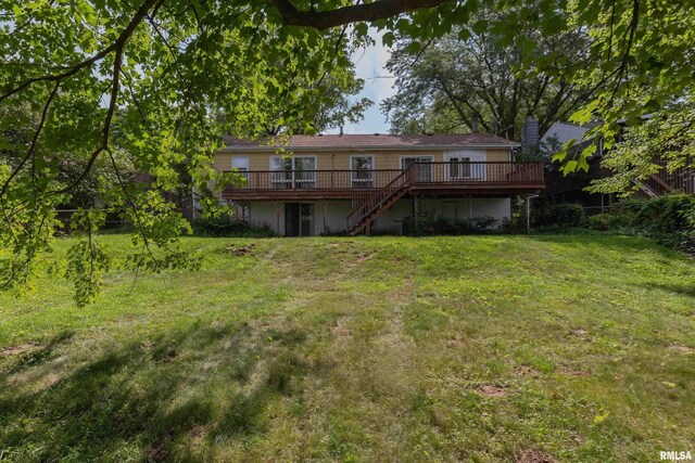 2518 13th St, Rock Island, IL 61201 - back of property with stairway, a deck, a yard, and a chimney