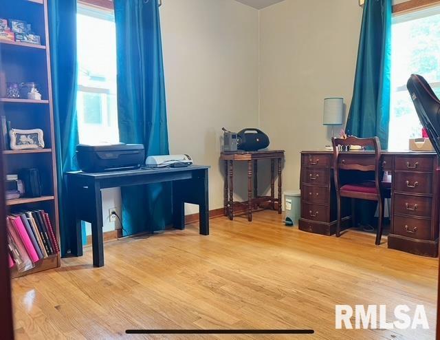 402 SW 7th Ave, Aledo, IL 61231 - office featuring healthy amount of natural light and wood finished floors