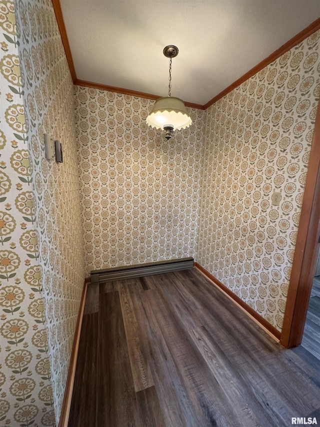 208BAGGOTT None St, Zeigler, IL 62999 - unfurnished dining area featuring wallpapered walls, crown molding, and wood finished floors
