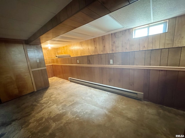 208BAGGOTT None St, Zeigler, IL 62999 - below grade area with a baseboard radiator and wooden walls