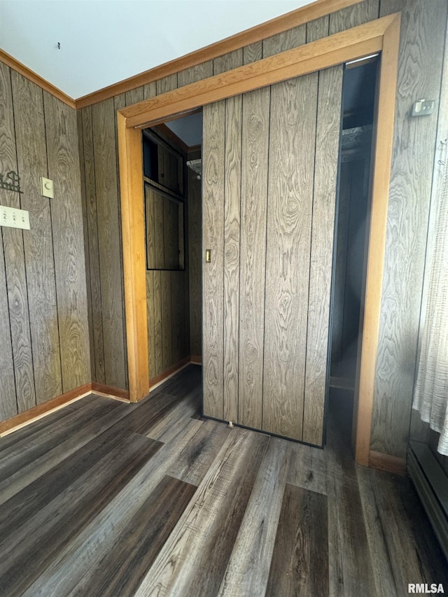 208BAGGOTT None St, Zeigler, IL 62999 - unfurnished bedroom featuring wood finished floors and wood walls