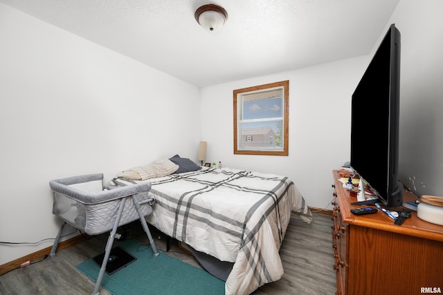 222 6th St, Buffalo, IA 52728 - bedroom featuring wood finished floors