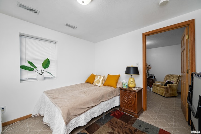 222 6th St, Buffalo, IA 52728 - bedroom with baseboards