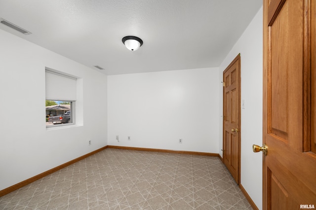 222 6th St, Buffalo, IA 52728 - empty room with light flooring and baseboards
