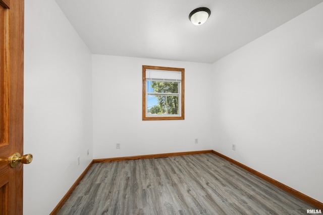222 6th St, Buffalo, IA 52728 - empty room with light wood finished floors and baseboards