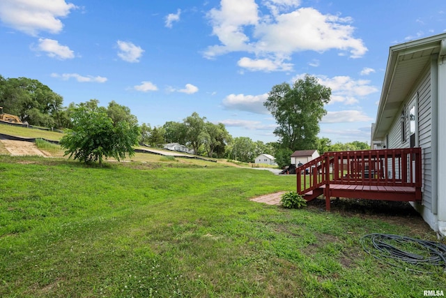 222 6th St, Buffalo, IA 52728 - view of grassy yard featuring a deck