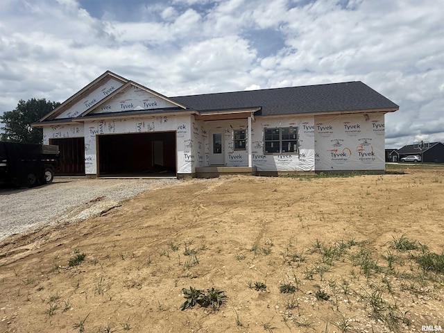 7091 Spring Creek Dr, Bettendorf, IA 52722 - unfinished property featuring an attached garage and driveway