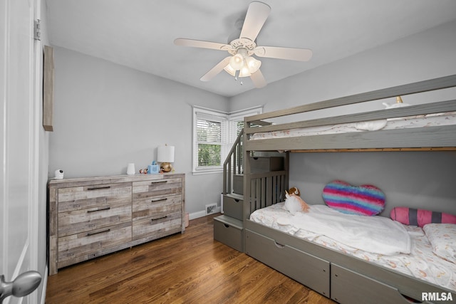 4040 27th Ave, Rock Island, IL 61201 - bedroom with dark wood-type flooring and a ceiling fan