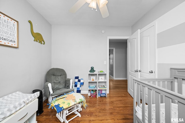 4040 27th Ave, Rock Island, IL 61201 - bedroom with wood finished floors and ceiling fan