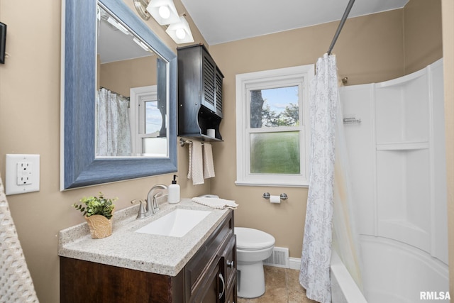 4040 27th Ave, Rock Island, IL 61201 - full bathroom with vanity, tile patterned floors, and shower / tub combo with curtain