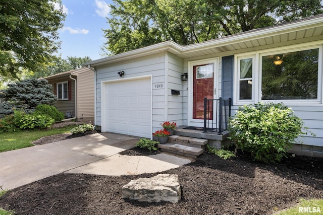 4040 27th Ave, Rock Island, IL 61201 - single story home with a garage and driveway