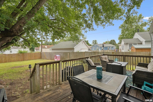 24 Berkshire Dr, Rock Island, IL 61201 - wooden terrace featuring a fenced backyard, a residential view, and outdoor dining area