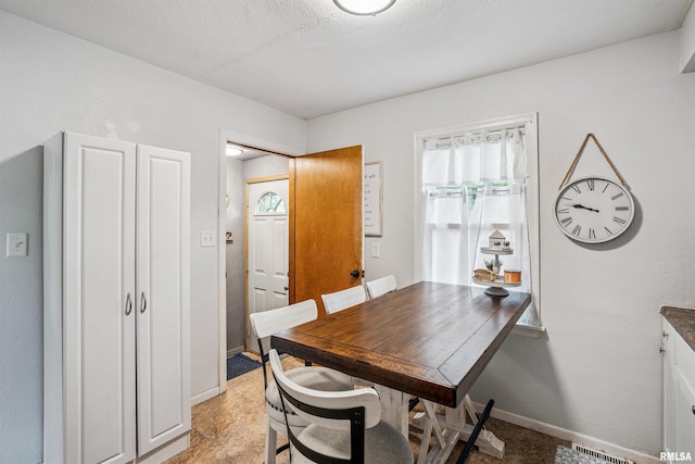 24 Berkshire Dr, Rock Island, IL 61201 - dining room with baseboards