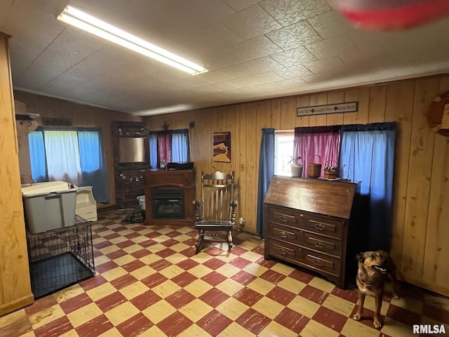 247 W Garfield St, Kewanee, IL 61443 - sitting room featuring tile patterned floors and wooden walls