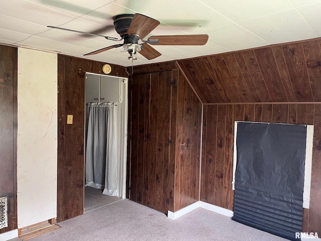 247 W Garfield St, Kewanee, IL 61443 - bonus room with wooden walls, ceiling fan, carpet floors, and vaulted ceiling