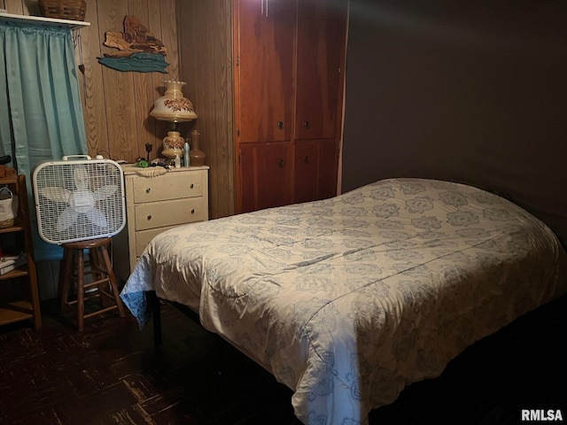 247 W Garfield St, Kewanee, IL 61443 - bedroom featuring a closet and wooden walls