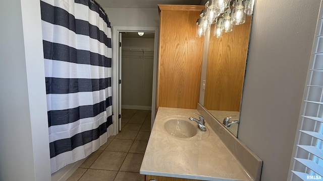 11279 Nora Ln, Carterville, IL 62918 - bathroom featuring tile patterned flooring, vanity, and a shower with shower curtain