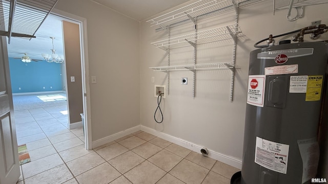11279 Nora Ln, Carterville, IL 62918 - laundry room with water heater, hookup for an electric dryer, hookup for a washing machine, light tile patterned flooring, and a chandelier