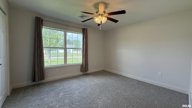 11279 Nora Ln, Carterville, IL 62918 - carpeted spare room featuring a ceiling fan and baseboards