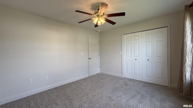 11279 Nora Ln, Carterville, IL 62918 - unfurnished bedroom featuring carpet flooring, a closet, and a ceiling fan