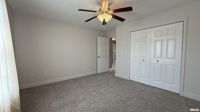 11279 Nora Ln, Carterville, IL 62918 - unfurnished bedroom featuring carpet, a closet, and ceiling fan