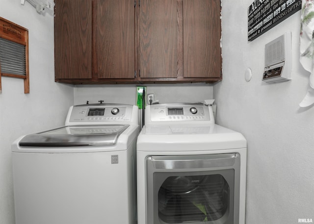 8527 W 17th St, Rock Island, IL 61201 - laundry area with cabinet space and independent washer and dryer