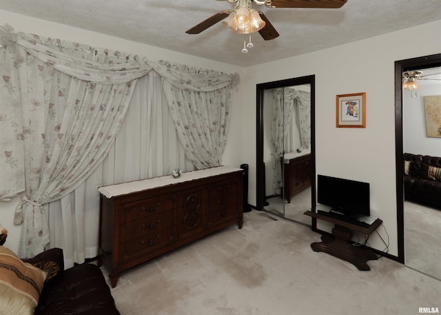 8527 W 17th St, Rock Island, IL 61201 - bedroom featuring light colored carpet and ceiling fan