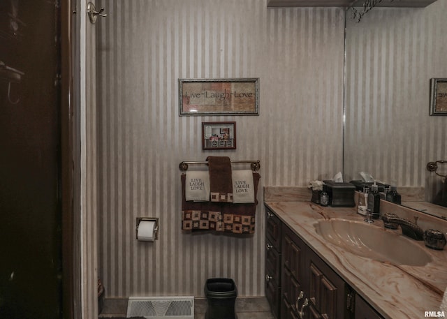 8527 W 17th St, Rock Island, IL 61201 - bathroom with wallpapered walls and vanity