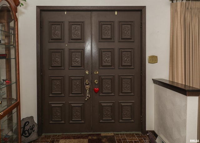 8527 W 17th St, Rock Island, IL 61201 - doorway to property with stucco siding and covered porch