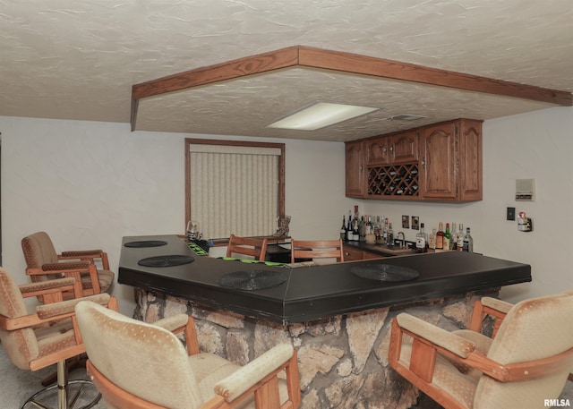 8527 W 17th St, Rock Island, IL 61201 - indoor bar featuring a textured ceiling