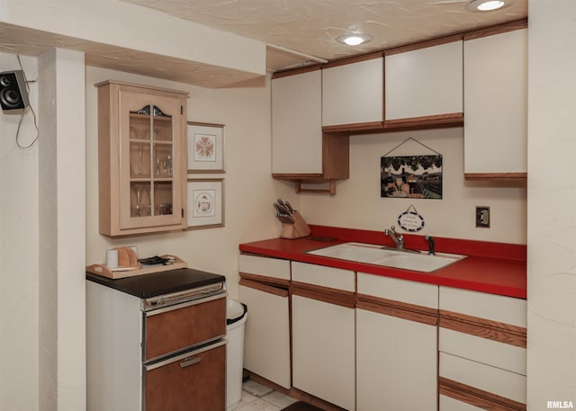 8527 W 17th St, Rock Island, IL 61201 - kitchen featuring recessed lighting and glass insert cabinets