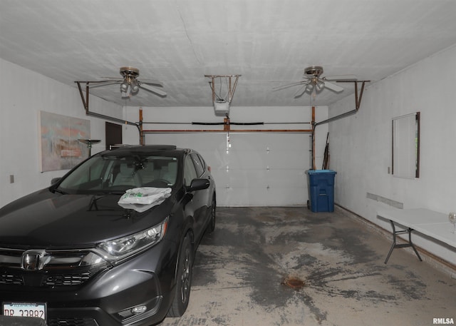 8527 W 17th St, Rock Island, IL 61201 - garage featuring a garage door opener and ceiling fan