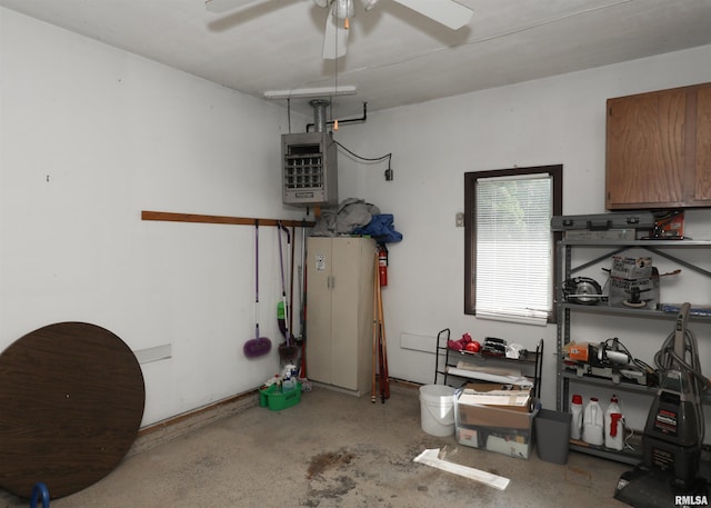 8527 W 17th St, Rock Island, IL 61201 - garage featuring a ceiling fan and a heating unit