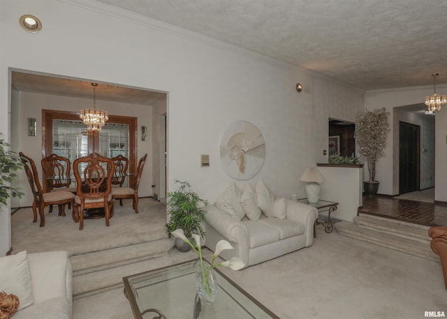 8527 W 17th St, Rock Island, IL 61201 - living room featuring a chandelier, carpet floors, ornamental molding, and a textured ceiling
