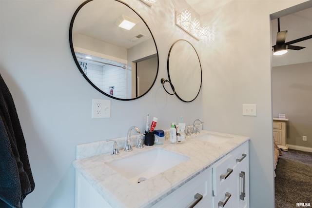 401 W Grand Ave, Carterville, IL 62918 - full bathroom with double vanity and a ceiling fan