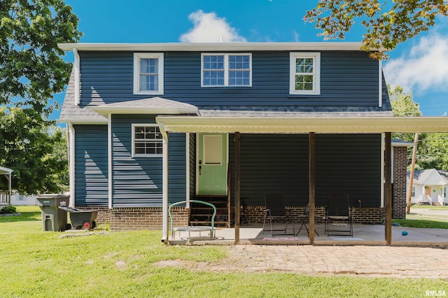 401 W Grand Ave, Carterville, IL 62918 - back of property with a yard and a patio area